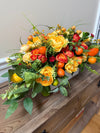 Citrus & Ranunculus Floral Arrangement for Summer