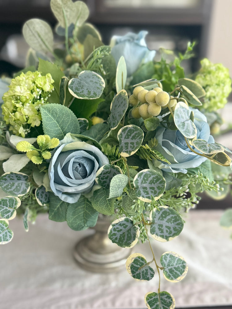 Luxury blue rose and green hydrangea arrangement for spring