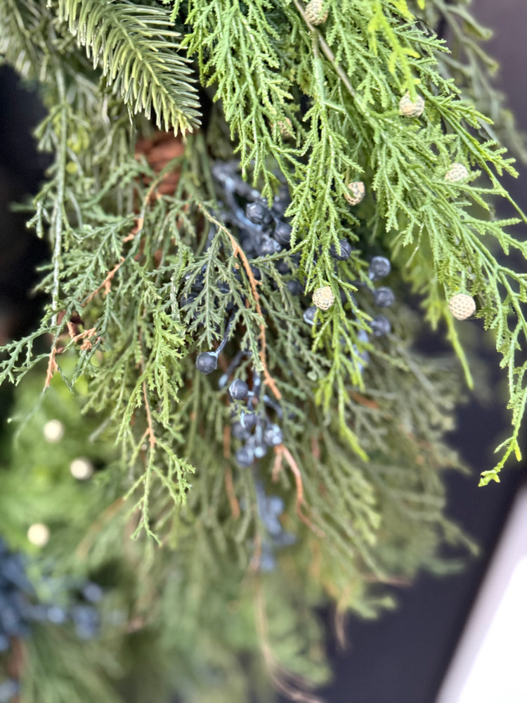 Cascading Pine & Cedar Wreath with Rustic Bells for Winter