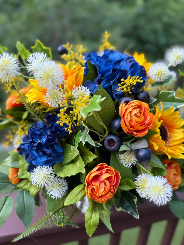 Vibrant Sunflower Arrangement with Deep Blue Ranunculus