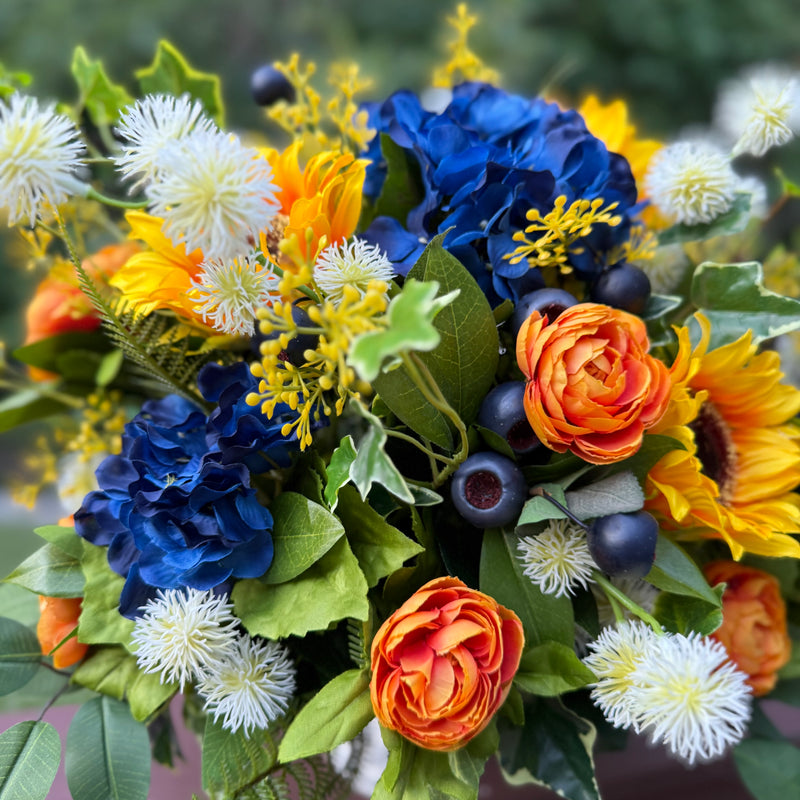 Vibrant Sunflower Arrangement with Deep Blue Ranunculus