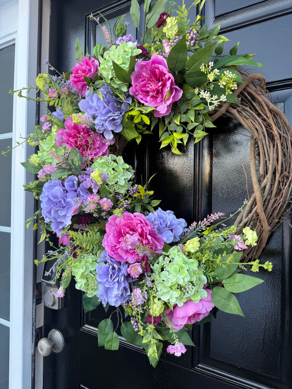 Spring garden bloom with peonies and hydrangea Wreath