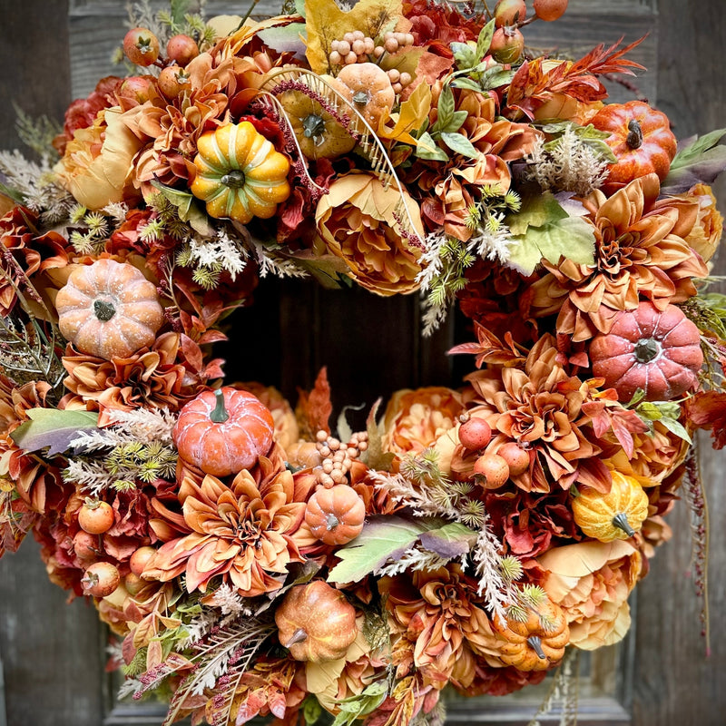Full Autumn Maple Leaves and Pumpkins