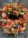 Full Autumn Maple Leaves and Pumpkins