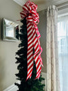 Red and White Striped Themed Tree Topper for Winter
