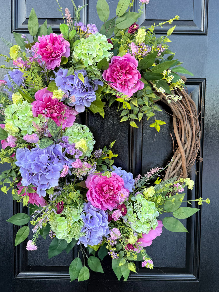 Spring garden bloom with peonies and hydrangea Wreath