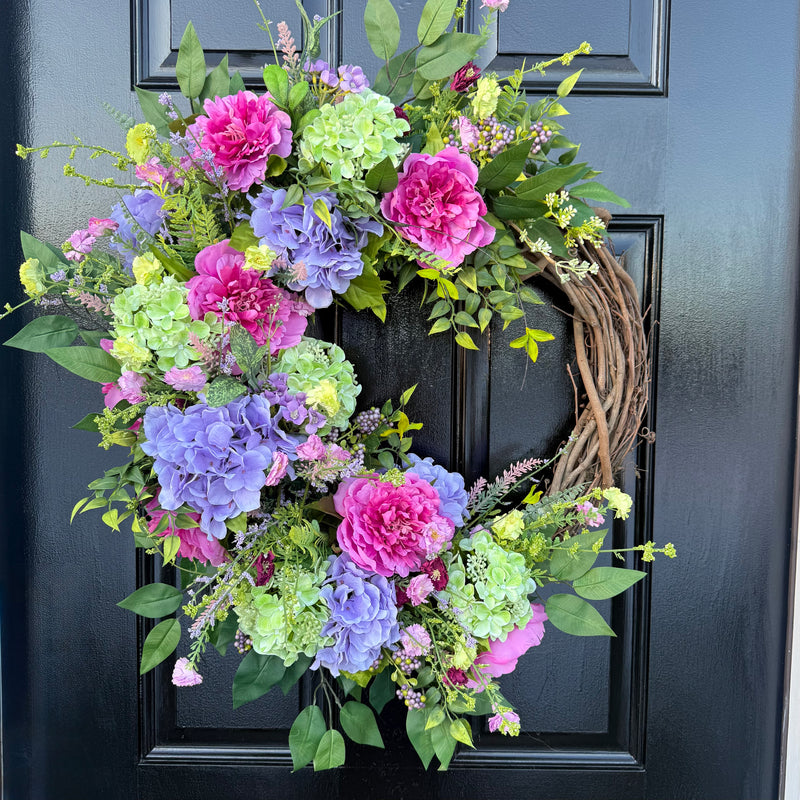 Spring garden bloom with peonies and hydrangea Wreath